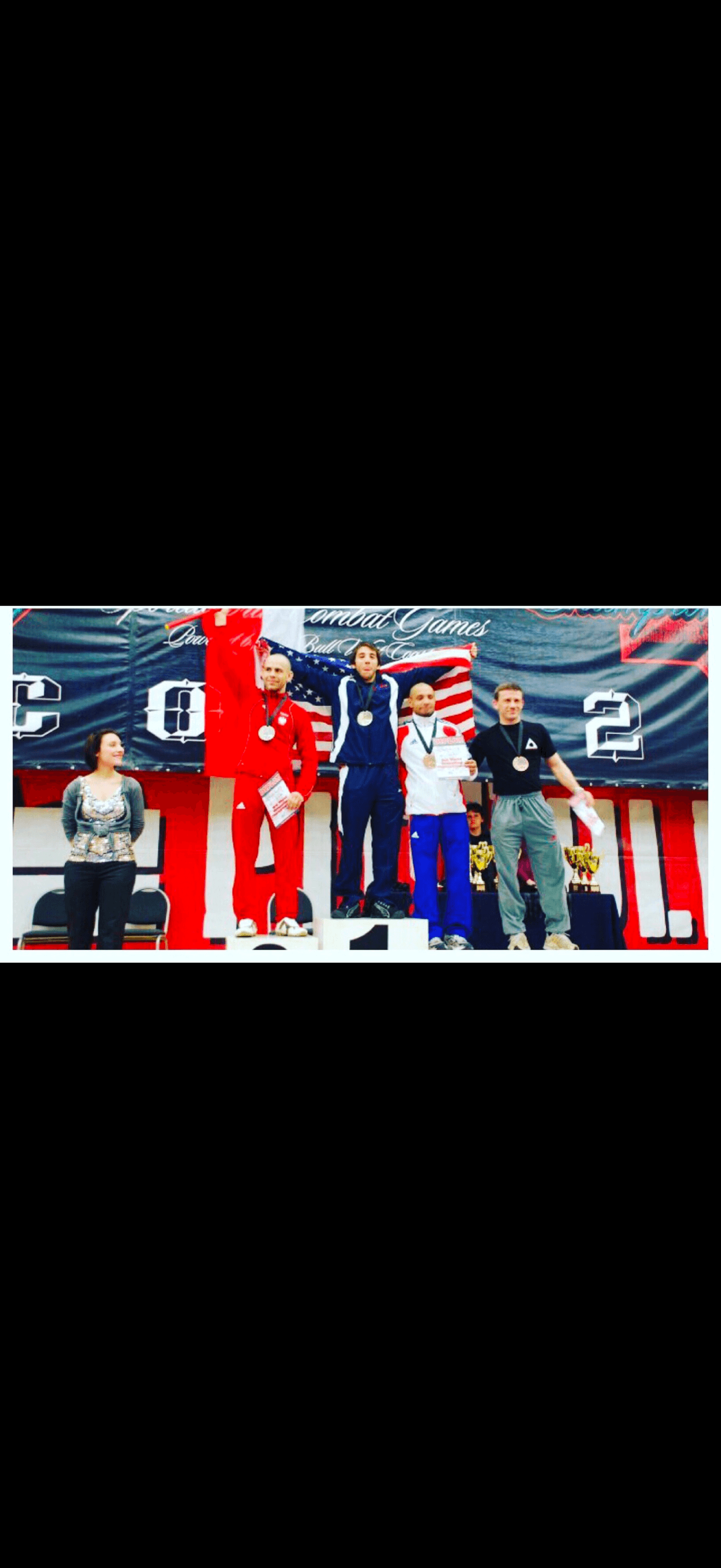 Denny Prokopos on a competition podium