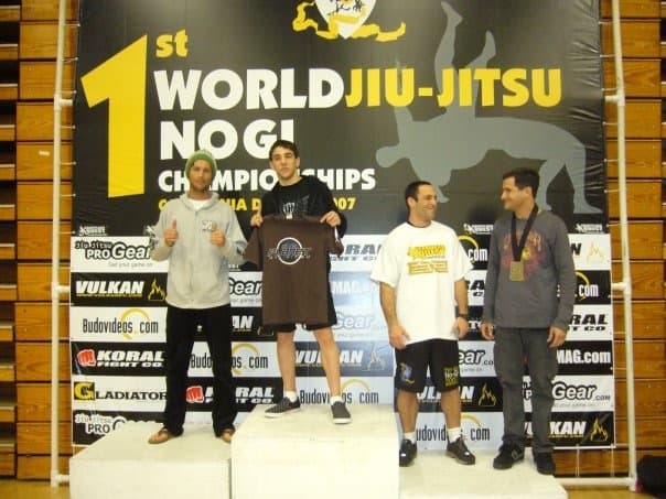 Denny Prokopos standing on the podium